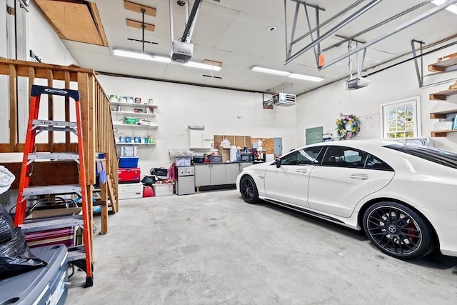 16 Old Colony Way, Whitman, MA 02382 - garage featuring a garage door opener