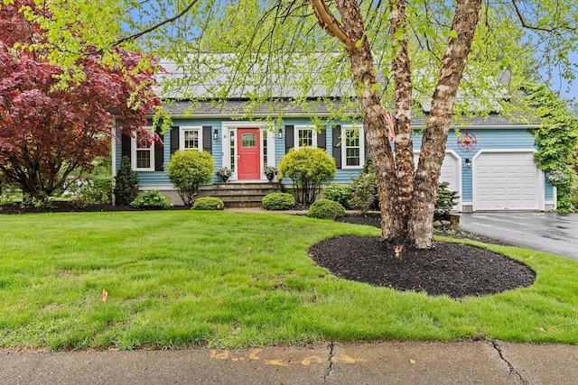 16 Old Colony Way, Whitman, MA 02382 - view of front facade featuring driveway, a front lawn, and a garage