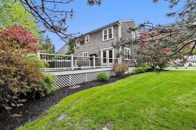 16 Old Colony Way, Whitman, MA 02382 - rear view of property with a lawn and a deck