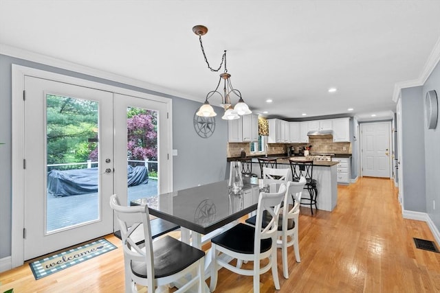 16 Old Colony Way, Whitman, MA 02382 - dining room featuring crown molding, light wood-style floors, baseboards, recessed lighting, and a chandelier