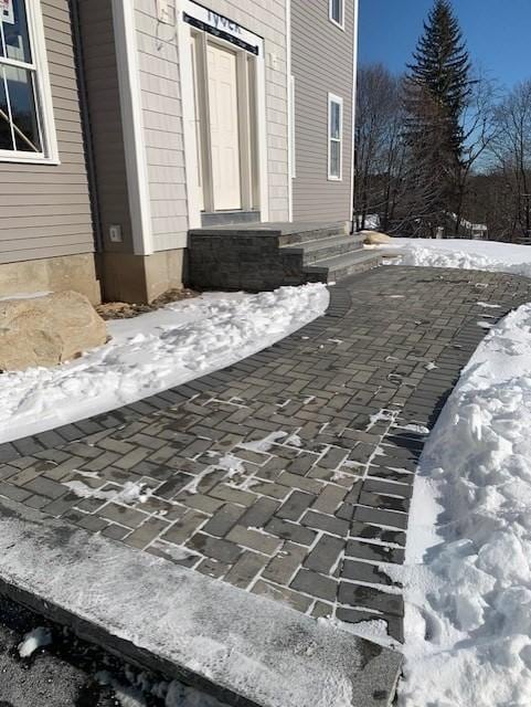 view of snow covered patio