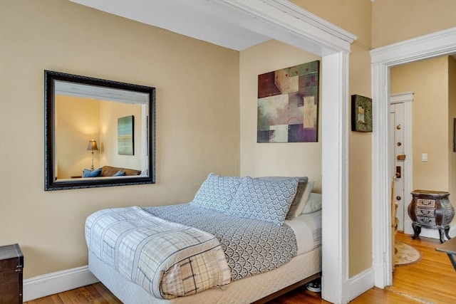 bedroom featuring hardwood / wood-style floors