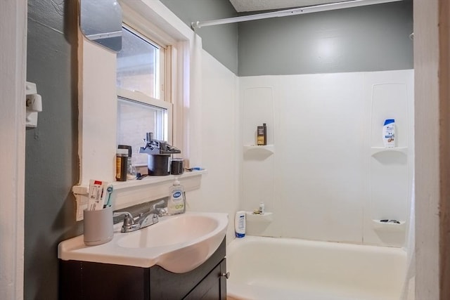bathroom with  shower combination and vanity