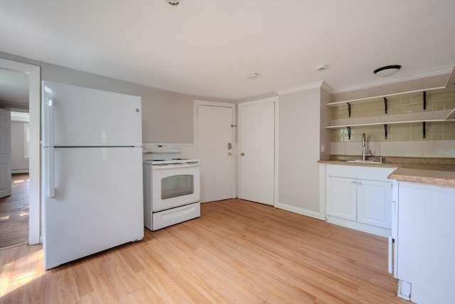 kitchen with white appliances, open shelves, a sink, light wood-type flooring, and baseboard heating