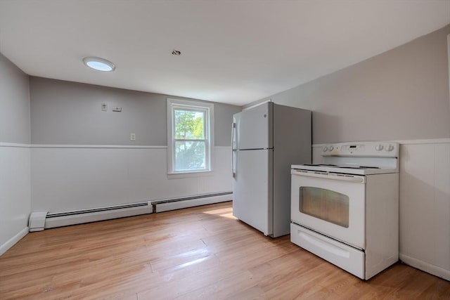 kitchen with white appliances, a baseboard radiator, and light wood-style flooring