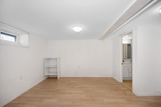 basement with light wood-type flooring