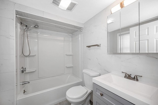 full bathroom featuring shower / tub combination, tile walls, backsplash, vanity, and toilet