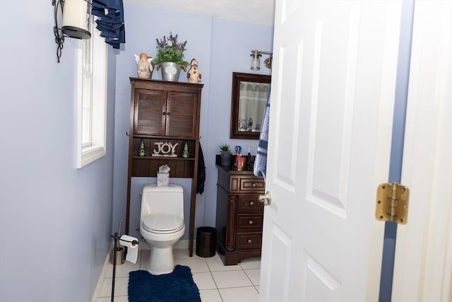 bathroom with tile patterned floors and toilet