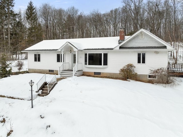 view of front of home with a chimney