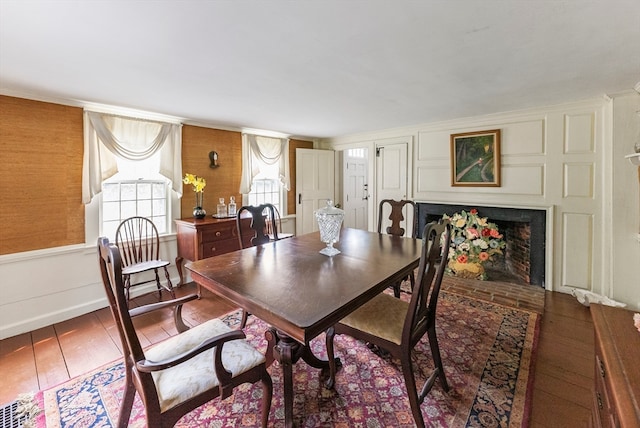 dining room with wood-type flooring