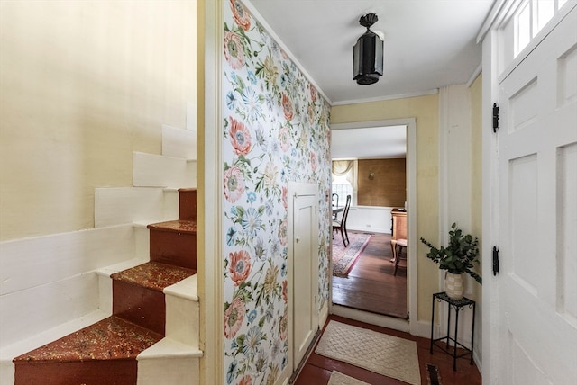 interior space featuring crown molding and hardwood / wood-style floors