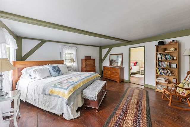 bedroom featuring beamed ceiling and wood-type flooring