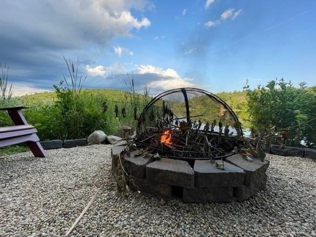 exterior space with an outdoor fire pit