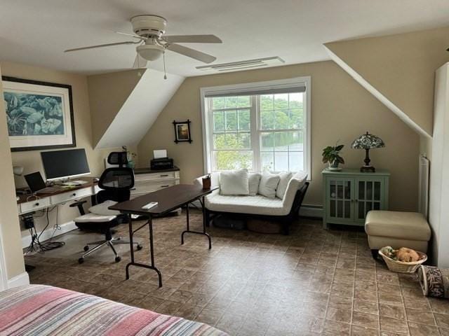 office space featuring ceiling fan, a baseboard radiator, and lofted ceiling