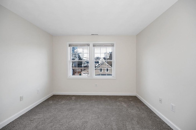 unfurnished room featuring carpet floors