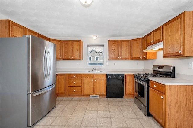 kitchen featuring appliances with stainless steel finishes and sink