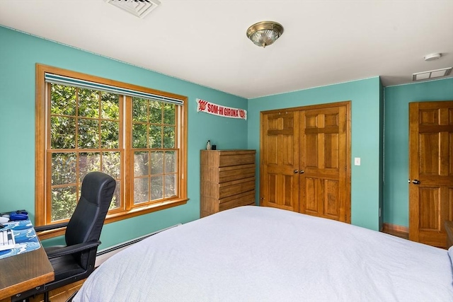 294 Cardinal Way, Northampton, MA 01062 - bedroom featuring a baseboard radiator, a desk, and a closet