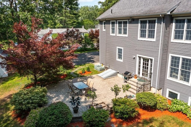 294 Cardinal Way, Northampton, MA 01062 - view of property exterior featuring a patio and roof with shingles