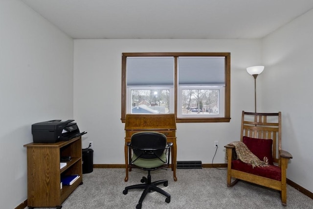 carpeted office with baseboards