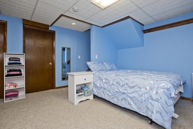 carpeted bedroom with baseboards