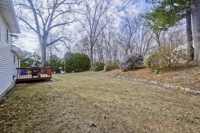 view of yard featuring a deck