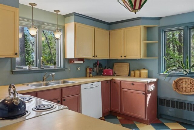 128 Lovell Rd, Holden, MA 01520 - kitchen featuring radiator, white dishwasher, a sink, light countertops, and decorative light fixtures