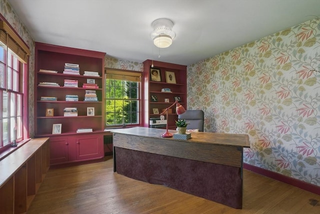 128 Lovell Rd, Holden, MA 01520 - office featuring wallpapered walls, wood finished floors, and baseboards