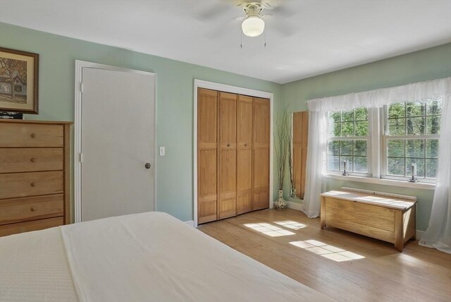 128 Lovell Rd, Holden, MA 01520 - bedroom featuring light wood-style floors, a closet, a ceiling fan, and baseboards