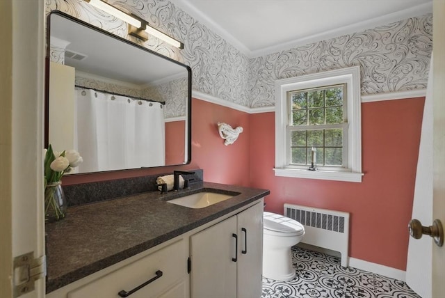128 Lovell Rd, Holden, MA 01520 - full bath featuring radiator, toilet, vanity, wallpapered walls, and baseboards