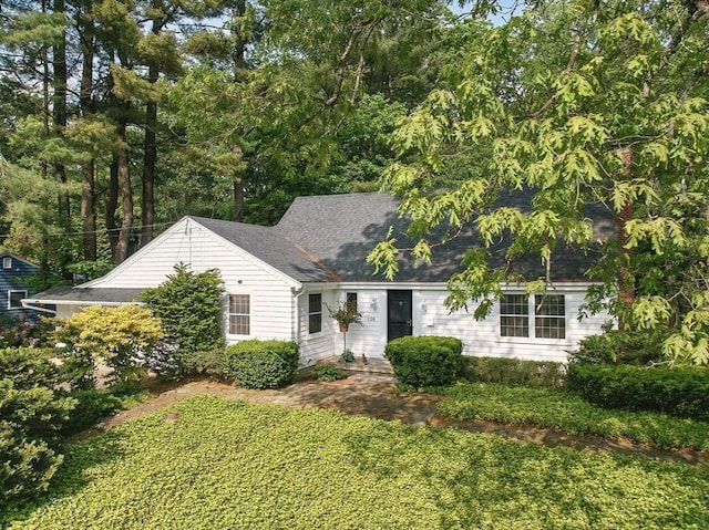 128 Lovell Rd, Holden, MA 01520 - view of front of house with roof with shingles and a front yard