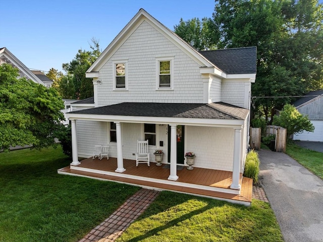 12 Short St, Cohasset, MA 02025 - view of front of home with a shingled roof, covered porch, and a front yard