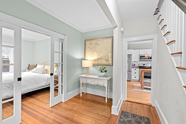 12 Short St, Cohasset, MA 02025 - hallway featuring light wood-style flooring and ornamental molding