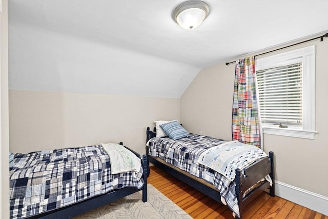 12 Short St, Cohasset, MA 02025 - bedroom featuring vaulted ceiling and wood finished floors