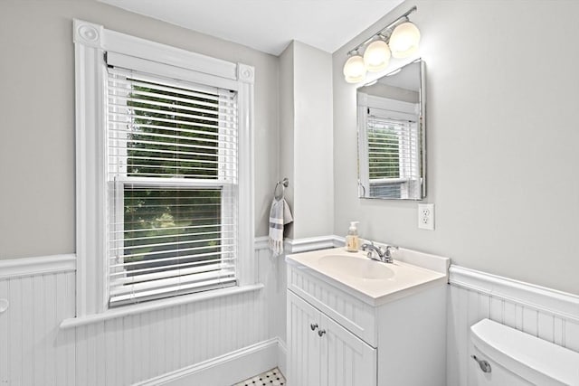 12 Short St, Cohasset, MA 02025 - half bathroom featuring wainscoting and vanity