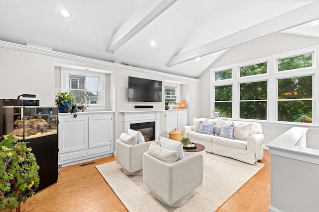 12 Short St, Cohasset, MA 02025 - living area featuring light wood-style flooring, a glass covered fireplace, and recessed lighting