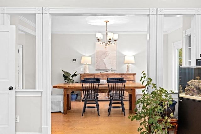 12 Short St, Cohasset, MA 02025 - dining room featuring ornamental molding, wood finished floors, and a chandelier