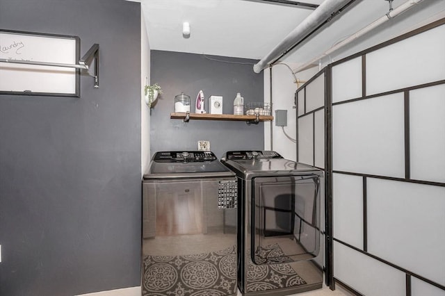129 Merrimac Unit 19, Newburyport, MA 01950 - laundry area with washing machine and dryer