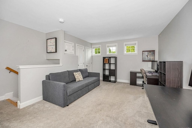 129 Merrimac Unit 19, Newburyport, MA 01950 - carpeted living area with a desk and baseboards