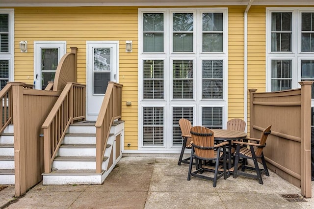 129 Merrimac Unit 19, Newburyport, MA 01950 - property entrance with a patio and outdoor dining area