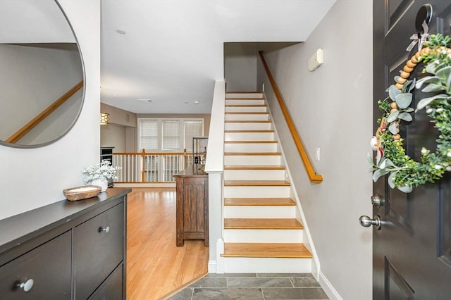129 Merrimac Unit 19, Newburyport, MA 01950 - stairway featuring baseboards