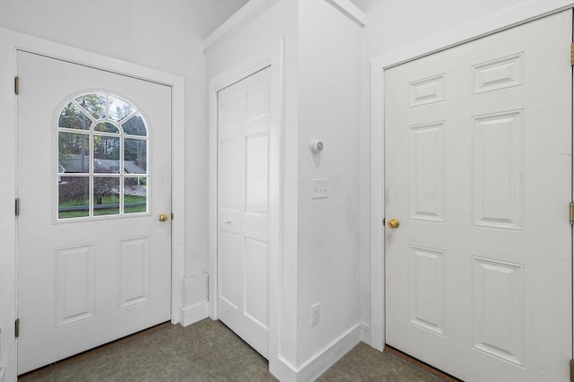 doorway with baseboards