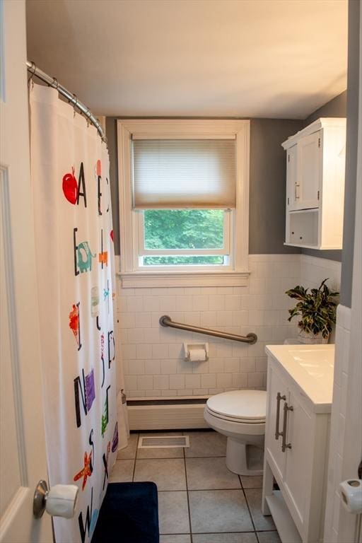 15 Lambert Ave, Stoughton, MA 02072 - bathroom featuring tile walls, tile patterned floors, vanity, a shower with shower curtain, and wainscoting