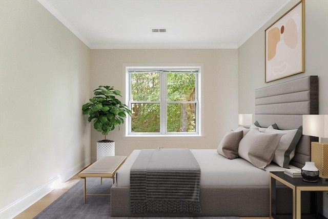 188 Newton Unit 6, Boston, MA 02135 - bedroom with crown molding, baseboards, and wood finished floors