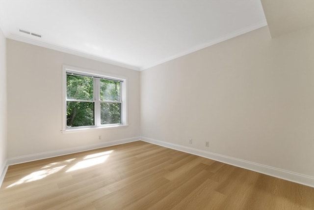 188 Newton Unit 6, Boston, MA 02135 - empty room featuring light wood-type flooring, baseboards, and ornamental molding