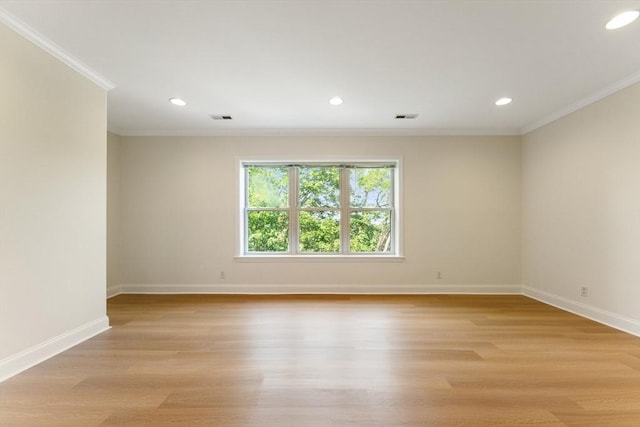 188 Newton Unit 6, Boston, MA 02135 - empty room featuring crown molding, baseboards, recessed lighting, and light wood finished floors