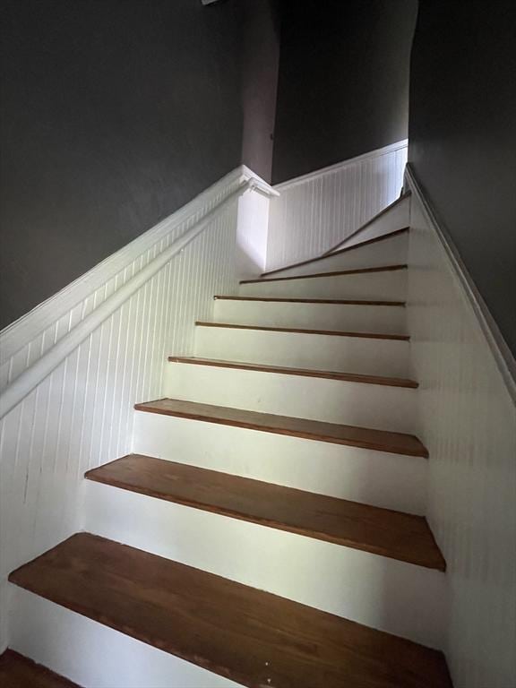 staircase with wainscoting