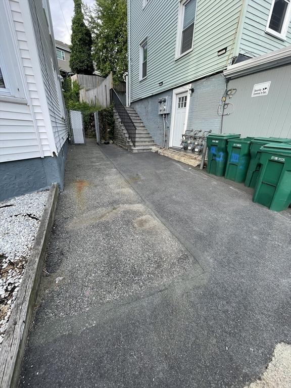 exterior space with stairs and fence