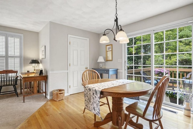 155 Burlington St, Woburn, MA 01801 - dining room featuring light wood-style floors, wainscoting, and a desk