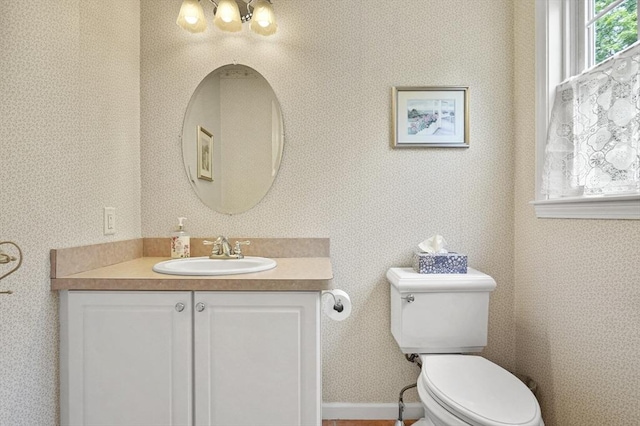 155 Burlington St, Woburn, MA 01801 - bathroom with vanity, toilet, and wallpapered walls