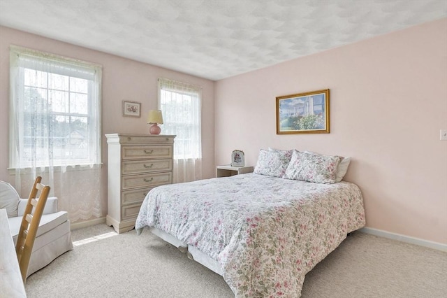 155 Burlington St, Woburn, MA 01801 - bedroom featuring baseboards and light colored carpet